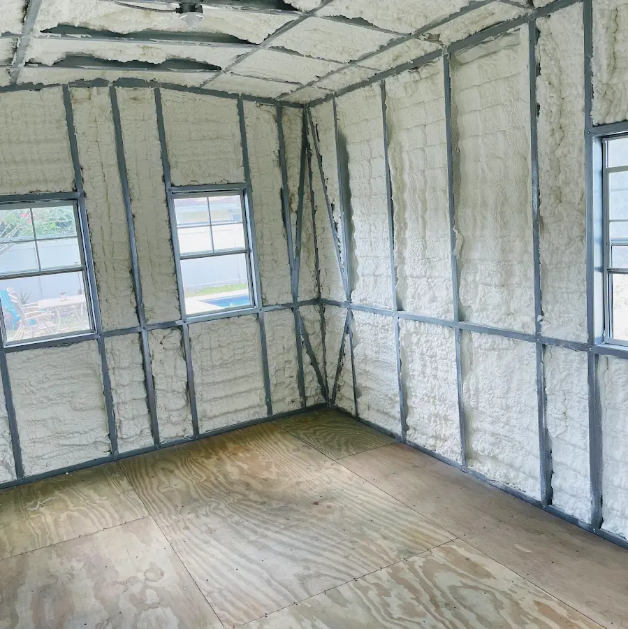 Closed-cell spray foam insulation applied to wall cavities in a residential project in New Brighton